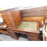 A twin pedestal desk with tooled leather type top and a similar pedestal cabinet.