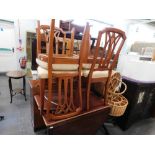 A modern cherrywood finish dining room suite, comprising drop leaf table side board and four chairs.