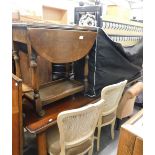 A drop leaf dinner wagon, dining room table, folding bed, two bergere backed chairs, nursing chair e