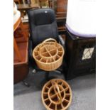 A swivel office chair and two wicker baskets with sectional interior sections.