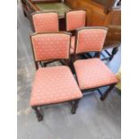 A set of four Curtis and Mawer oak dining chairs with labels.