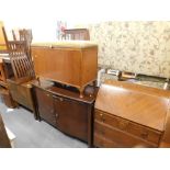 A walnut finish dining table and 2 chairs, various other furniture, side cabinet, ottoman and an oak