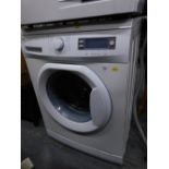 An Amica AWN712D Washing Machine