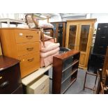 A three drawer filing cabinet, bergere chair, upholstered arm chair, glazed bookcase, light wood des