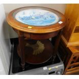 A coffee table with wheatsheaf transfer emblem and farming scene top