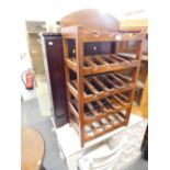 A hardwood wine rack and a two door CD rack.