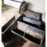 Six various small feeding troughs, the largest marked J Howitt & Sons. Newark., 80cm wide.