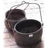 Two cast iron cooking pots or cauldrons (AF).