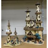 Two studio pottery models of castles, 51cm high and 29cm high.