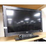 An LG 26" television, with lead and remote.