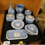 A group of Wedgwood blue Jasperware, to include trinket boxes and covers, pin dishes, etc. (1 tray)