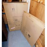 An Argos pressure fit pet gate, boxed, and a triple door stainless steel bathroom cabinet, 60cm x 90