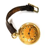 An early 20thC lady's fob watch, stamped 18k, open faced, keyless wind, the circular dial bearing Ro