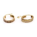 A pair of hoop earrings, channel set with white stones, stamped 9kt, 2.6g. (AF)