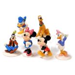 Six Royal Doulton The Mickey Mouse Collection figures, comprising Pluto, Daisy Duck, Donald Duck, Go