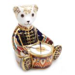 A Royal Crown Derby porcelain Drummer Bear paperweight, an exclusive signature edition of 1500 for G