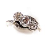 An 18ct white gold and diamond three stone ring, with diamond set shoulders, approx 1ct, size Q, 3.7