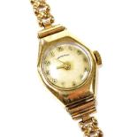A mid century Walker & Hall lady's 9ct gold cased wristwatch, circular champagne dial bearing Arabic