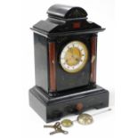A late 19thC French slate and marble mantel clock, engine turned brass dial, with enamel chapter rin