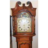 W. Wilson Belper. A 19thC oak longcase clock, the arched dial painted with a river landscape with c