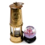 A Protector Lamp and Lighting Company type six brass miner's lamp, 23cm high, a Caithness Madrigal p