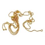 An 18ct gold floral and bead link fringe necklace, on a bolt ring clasp, 8.3g.