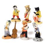 A Beswick Pottery cat band, boxed, comprising Glam Guitar, Ratcatcher Bilk, Feline Flamenco, Calypso