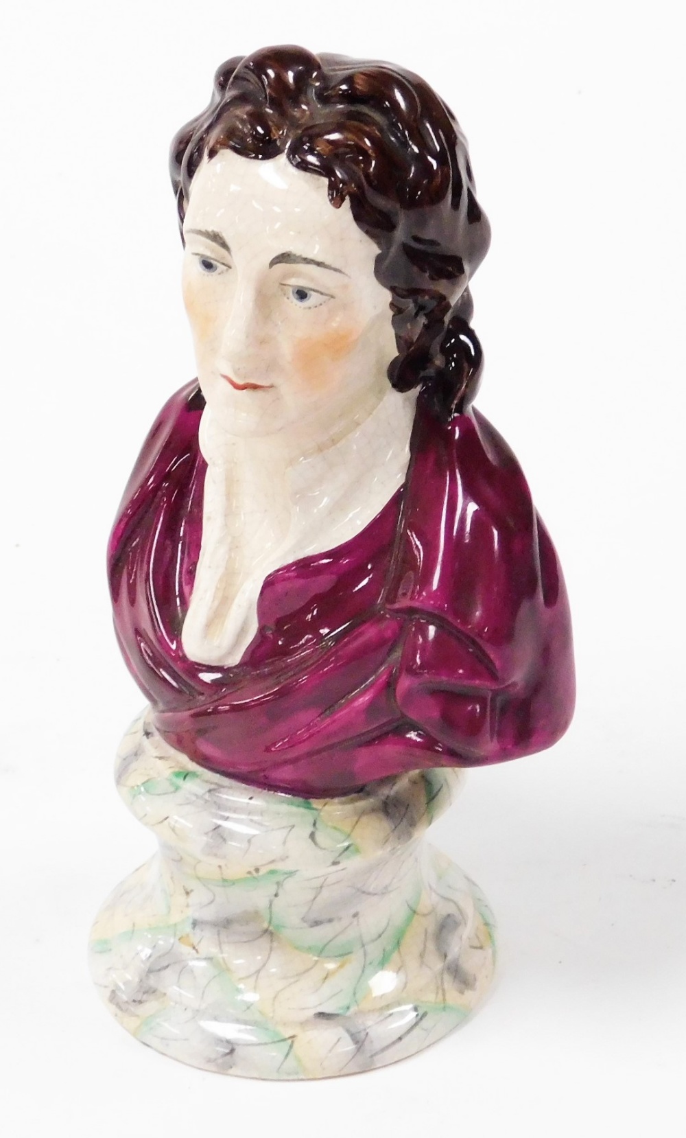 A late 19thC William Kent pottery bust of John Locke, modelled in a red tunic, on a simulated marble
