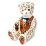 A Royal Crown Derby porcelain Teddy Bear paperweight, silver stopper and red printed marks, 11cm hig