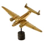 A WWII period brass model of an RAF Lockhead Hudson bomber, on stand, 13cm high.