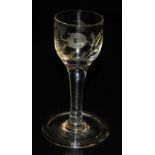 A late 18thC Georgian wine glass, the bowl engraved with bird and flower, alluding to Jacobite sympa