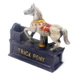 A replica cast iron trick pony money box, 18.5cm wide.
