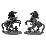 A pair of spelter Marley horses, 31cm wide.