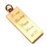 A 9ct gold ingot pendant, presentation engraved and dated 1978, 32.5g.
