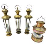 A Seahorse copper mast head lamp, 19.5cm high, together with three Indian tin lanterns, 34cm high. (