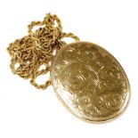 A 9ct gold oval photo locket, floral and foliate engraved, on a rope twist neck chain, with a bolt r