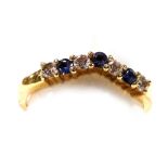 A 14ct gold sapphire and diamond seven stone wishbone eternity ring, size N, 2.8g.