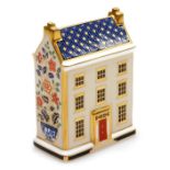 A Royal Crown Derby porcelain Georgian Townhouse paperweight, red printed marks, 10cm high, boxed.