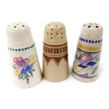 Three Poole pottery flower sifters, one traditionally painted with flowers, another with geometric f