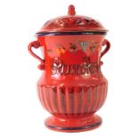 A German Rumtopf storage jar, decorated with berries, 30cm high.