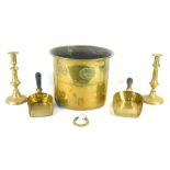 A group of brass wares, comprising an Art Nouveau style floral coal bucket, 23cm high, a pair of tap