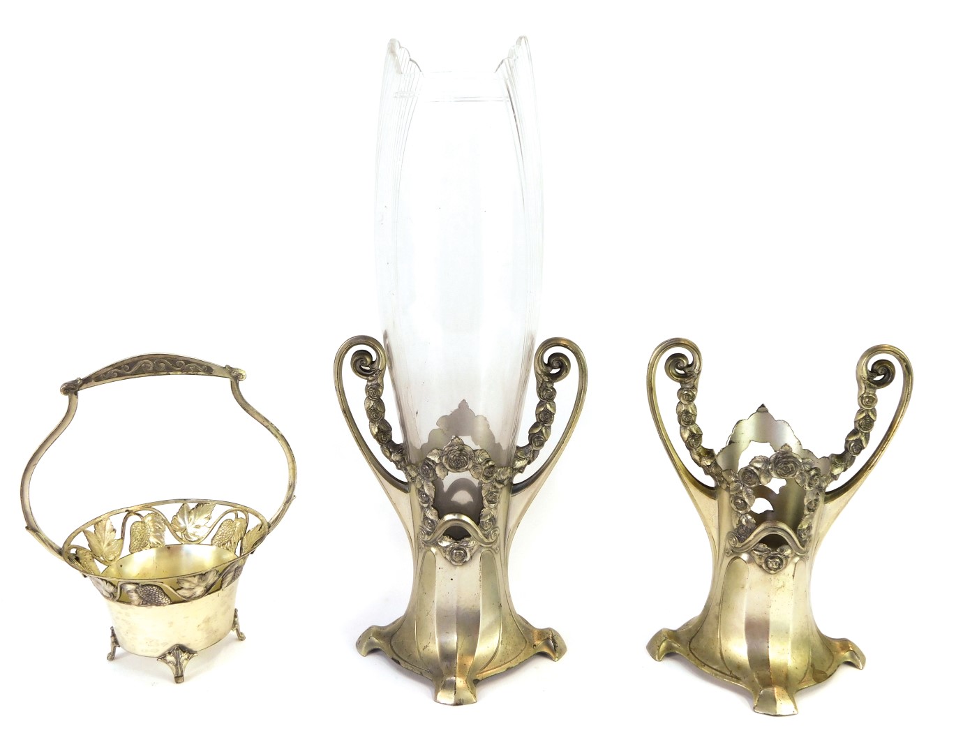 A pair of WMF metal vases, of twin handled form embossed with rose swags, one with glass vase insert