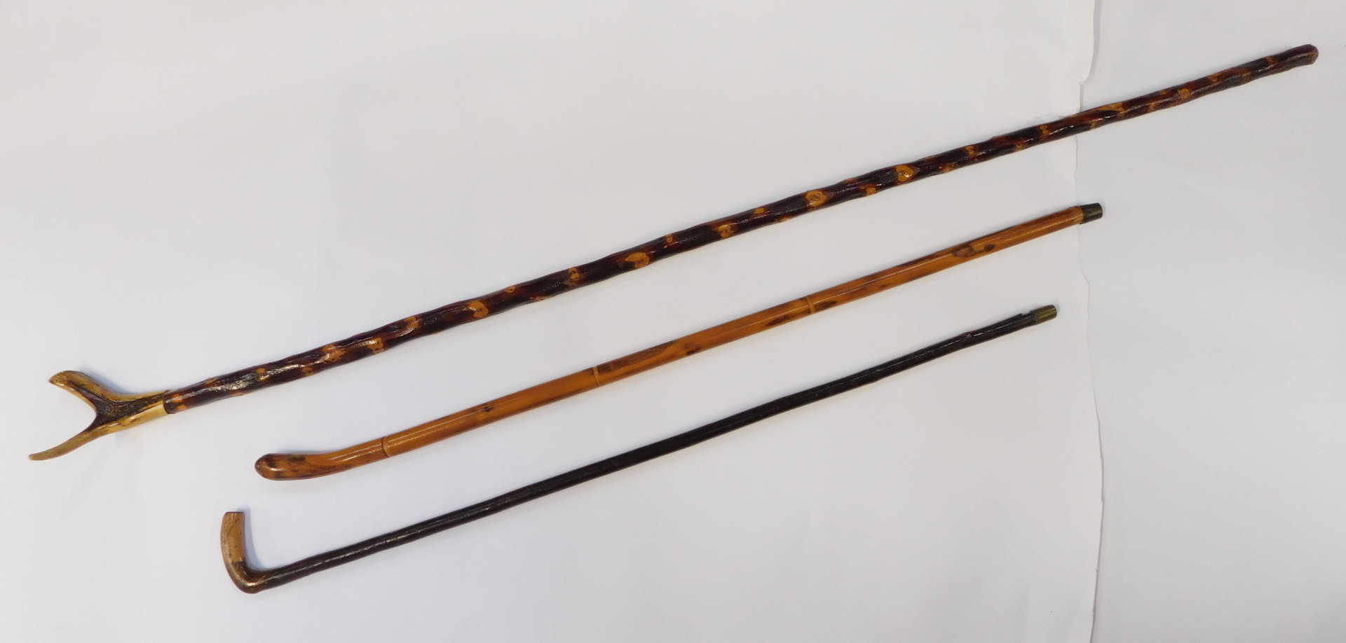 Three walking sticks, comprising a horn handled hiking stick, 133cm long, and two turned examples. ( - Image 2 of 2