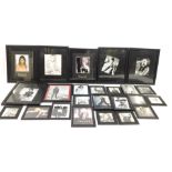 A group of framed celebrity photographs, some bearing signatures, to include Liz Hurley, Adam West,