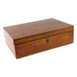 An early 20thC mahogany writing box, with brass escutcheon, lacking interior, 11cm high, 35cm wide,