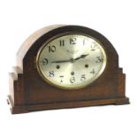 A Bravingtons Limited of Kings Cross and Ludgate HIll London oak cased mantel clock, in the Art Deco