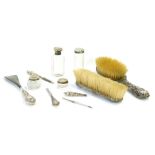 A group of silver dressing table items, comprising silver backed hand brush, clothes brush, shoe hor