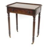 A 19thC mahogany side table in the manner of Gillows, with a galleried top above a single drawer on