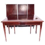 An Edwardian mahogany dining table, with rectangular ends on square taper legs with spayed feet, 131