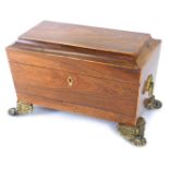 A Regency rosewood sarcophagus shaped tea caddy, with mother of pearl key hole and brass ring handl